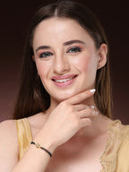 NVR Women Gold-Polished & Black Brass AD-Studded Hand Mangalsutra Bracelet | Grocsy