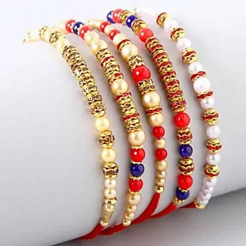 Designer Rakhis and Cadbury Celebrations Box | Grocsy