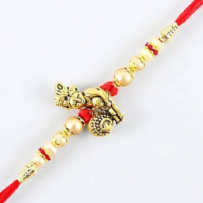 Divine Lord Krishna Pearl Rakhi & Kaju Roll Box | Grocsy