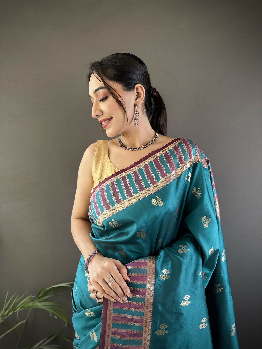 Joban Fashion Teal Blue Woven Zari Motifs Lichi Silk Banarasi Silk Saree | Grocsy