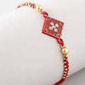 Sleek American Diamond Rakhi And Soan Papdi | Grocsy