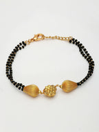 NVR Women Gold-Polished & Black Brass Hand Mangalsutra Link Bracelet | Grocsy
