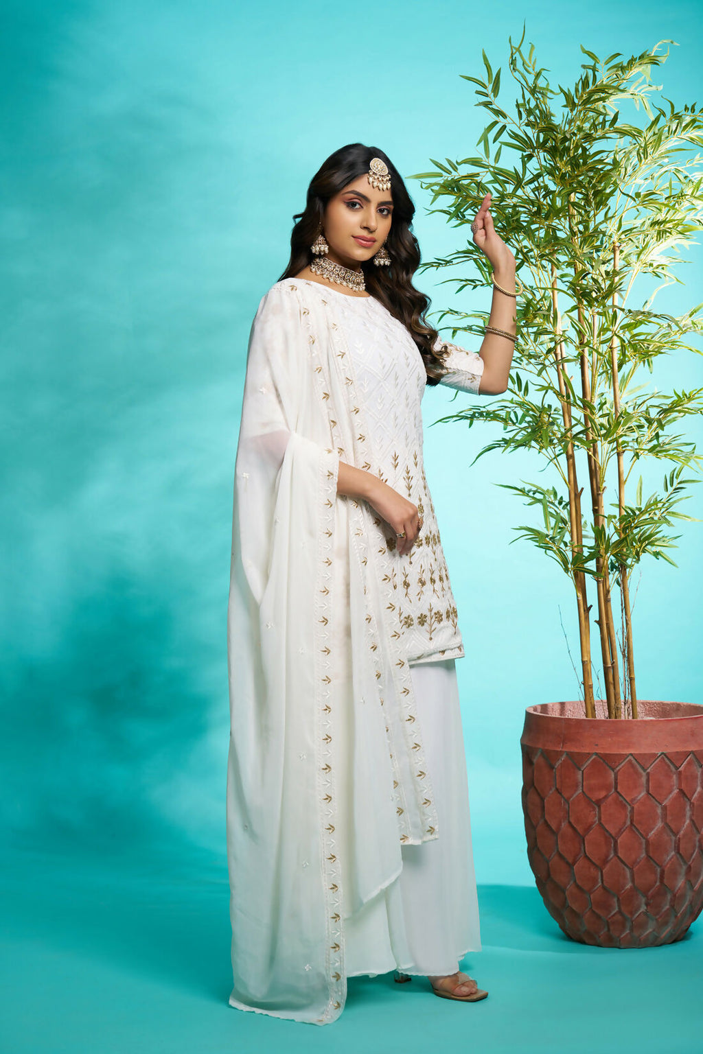 Aayaa Designer Faux Gorgette Embroidery Zari Sequins Thread work Full Flaired plazzo Suit with Dupatta - Off White | Grocsy