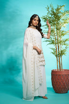 Aayaa Designer Faux Gorgette Embroidery Zari Sequins Thread work Full Flaired plazzo Suit with Dupatta - Off White | Grocsy