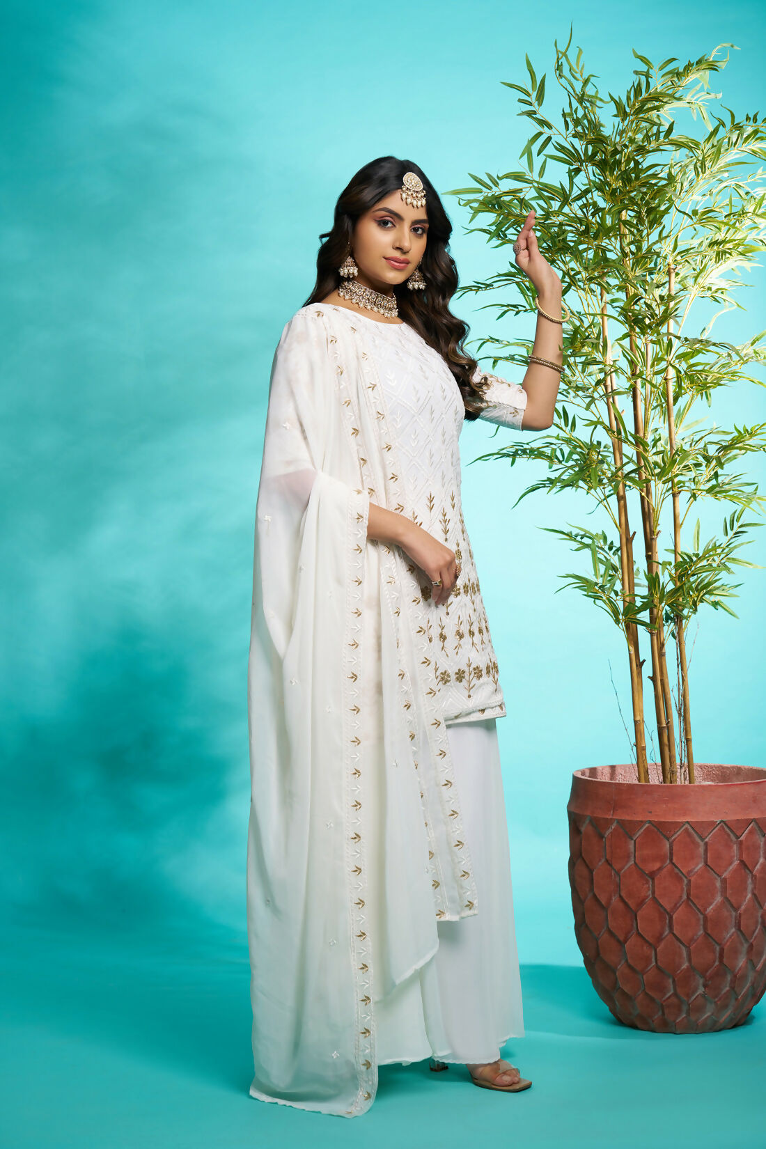 Aayaa Designer Faux Gorgette Embroidery Zari Sequins Thread work Full Flaired plazzo Suit with Dupatta - Off White | Grocsy