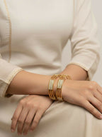 NVR Women Set of 2 Gold Plated CZ Stone Kada Bangle | Grocsy