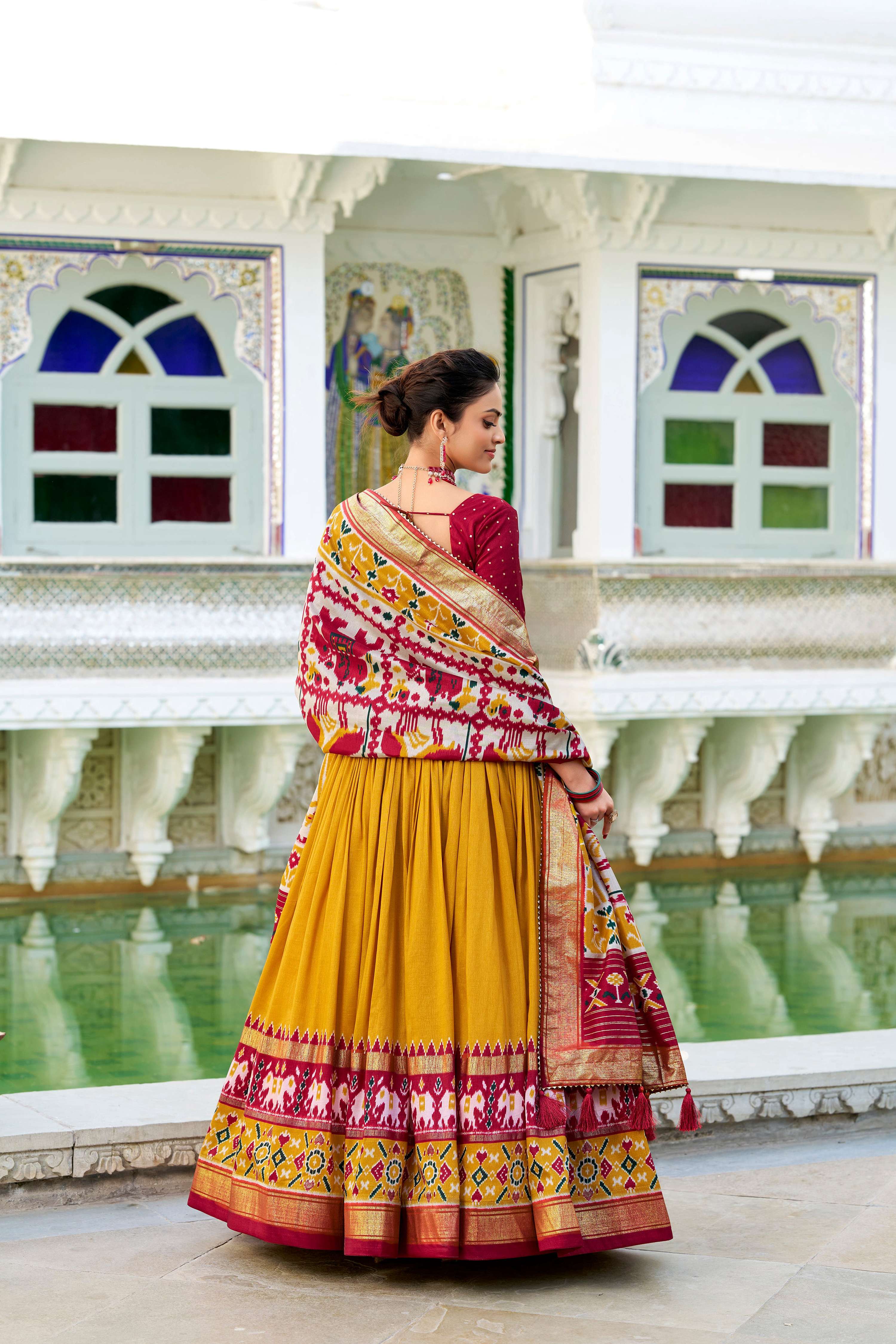 Evanik Mustard Traditional Style Tussar Silk Patola Print With Foil Work Unstitched Lehenga Choli | Grocsy