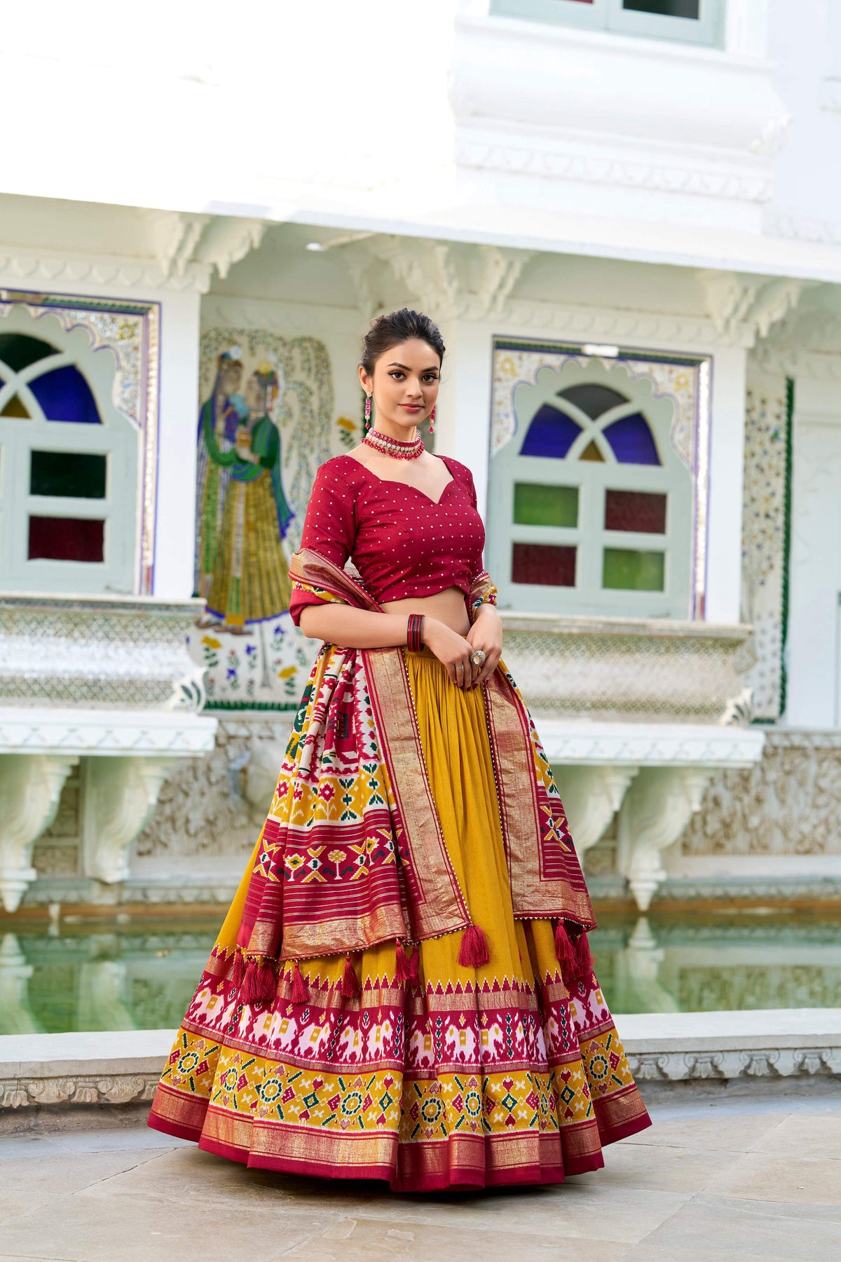 Evanik Mustard Traditional Style Tussar Silk Patola Print With Foil Work Unstitched Lehenga Choli | Grocsy