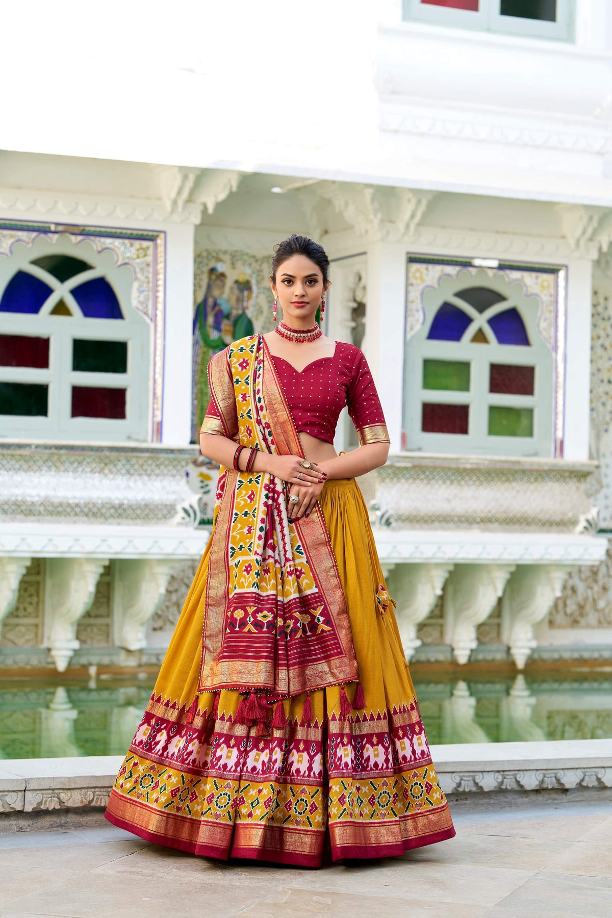 Evanik Mustard Traditional Style Tussar Silk Patola Print With Foil Work Unstitched Lehenga Choli | Grocsy