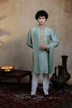 Falling Raw Silk Olive Green Kalika Kurta Set By Hilo Design | Grocsy