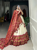 Lorenvalley Offwhite and Red Tussar Silk Patola Print Lehenga Choli | Grocsy