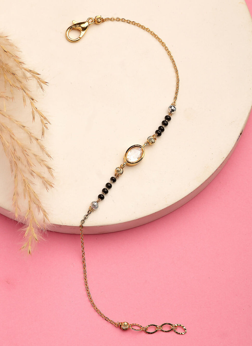 NVR Women Gold-Polished & Black Brass Stone-Studded Hand Mangalsutra Link Bracelet | Grocsy