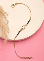 NVR Women Gold-Polished & Black Brass Stone-Studded Hand Mangalsutra Link Bracelet | Grocsy