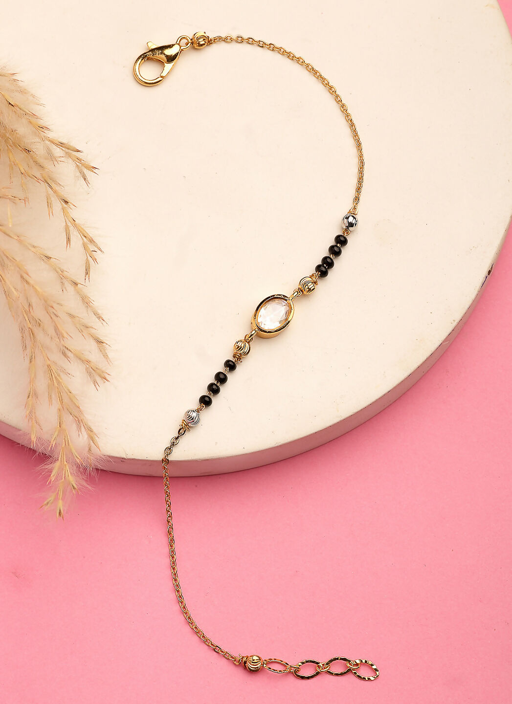 NVR Women Gold-Polished & Black Brass Stone-Studded Hand Mangalsutra Link Bracelet | Grocsy