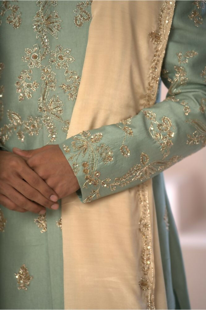 Majestic Mint Green Dupion Silk Sherwani With Satin Dhoti & Santone Dupatta by Hilo Design | Grocsy