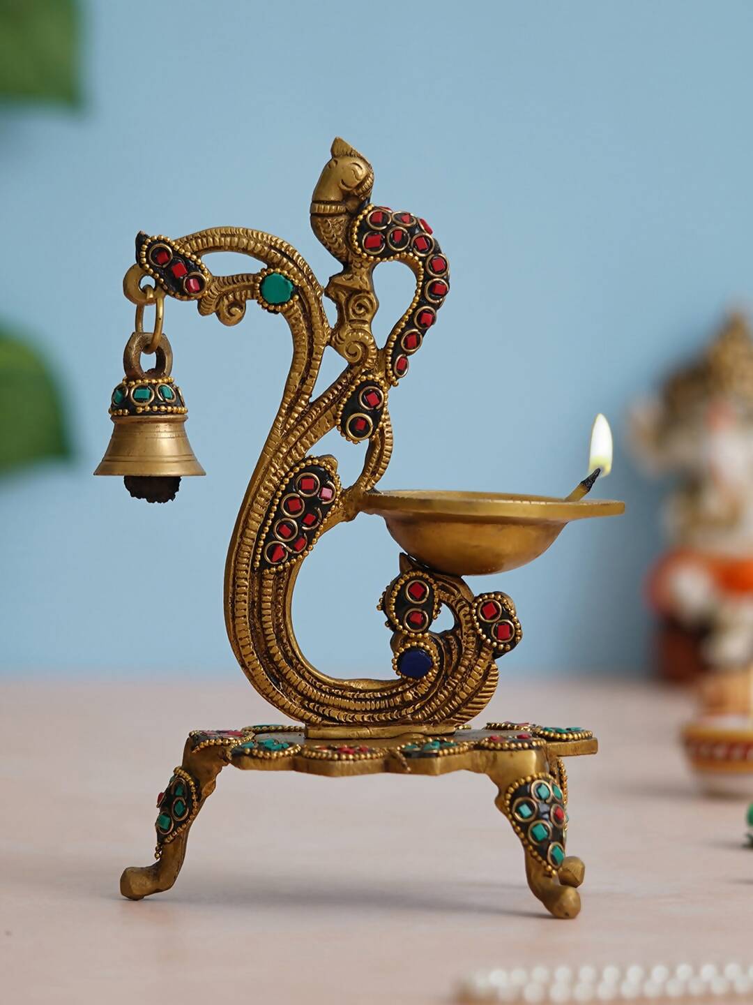 eCraftIndia Gold Toned Peacock Shaped Traditional Brass Diya With Bell & Stand | Grocsy