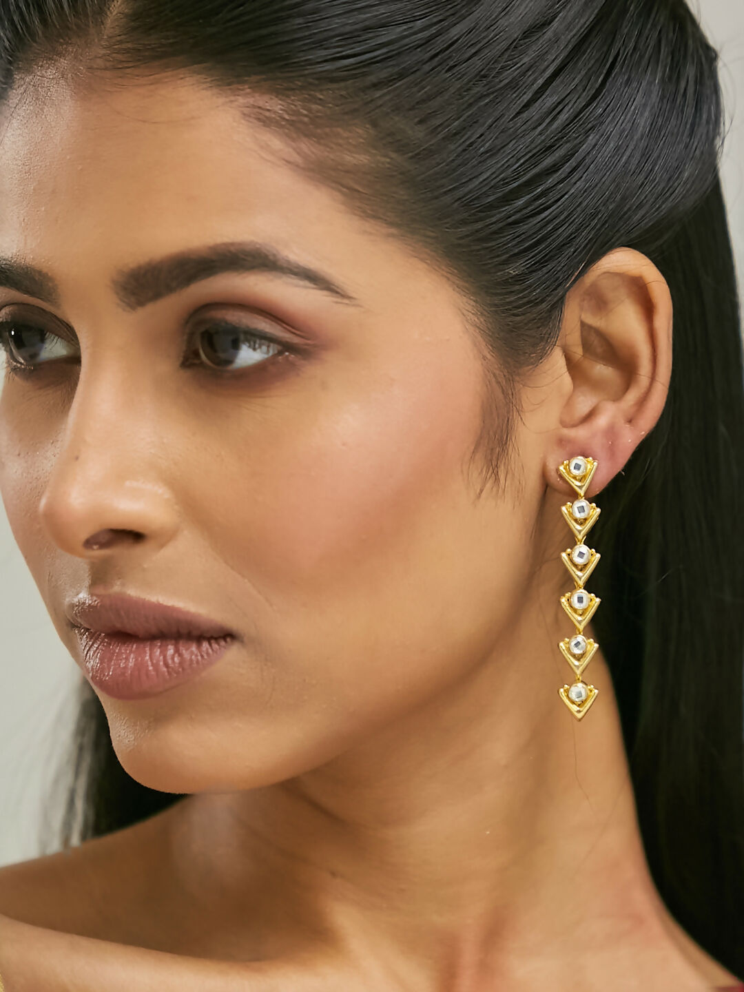 Nuyug 18K Gold-Plated Crystal Stone Studded Triangular Drop Sleek Earrings | Grocsy