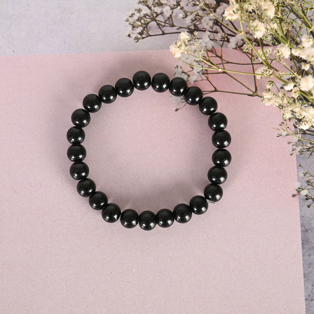 NVR Men & Women Black Marbel Crystal Elasticated Bracelet | Grocsy