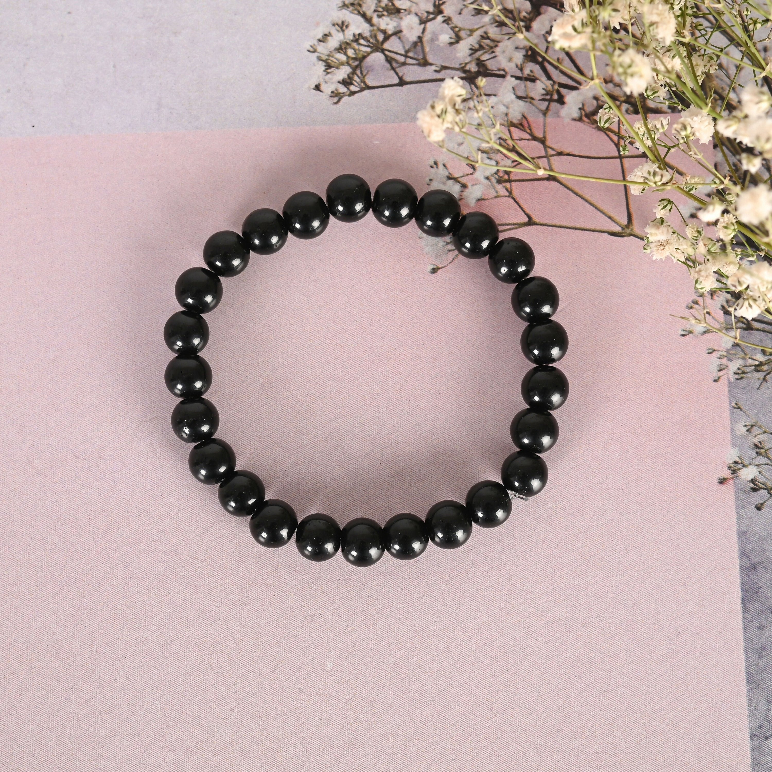 NVR Men & Women Black Marbel Crystal Elasticated Bracelet | Grocsy