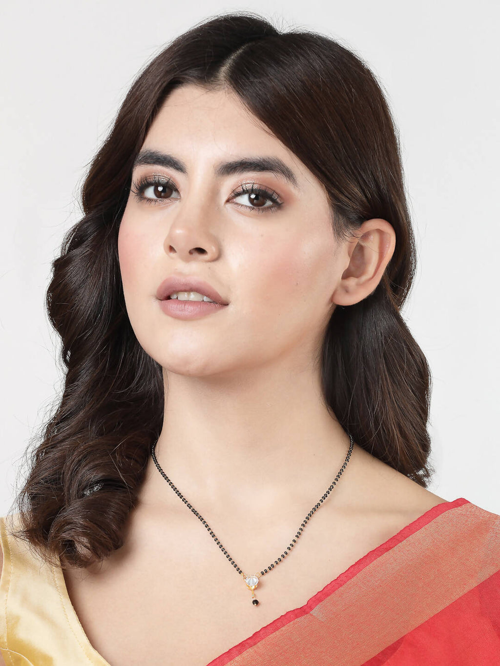 NVR Women Ethnic Gold-Polished Beaded Mangalsutra With Ad Stone | Grocsy