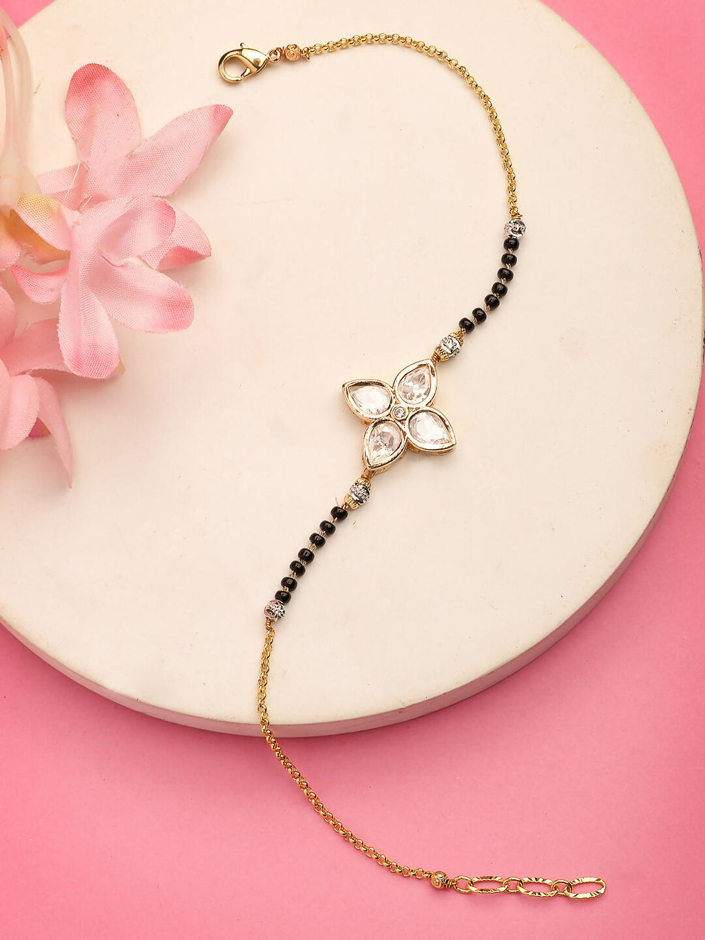 NVR Women Gold-Polished & Black Brass Stone-Studded Hand Mangalsutra Link Bracelet | Grocsy
