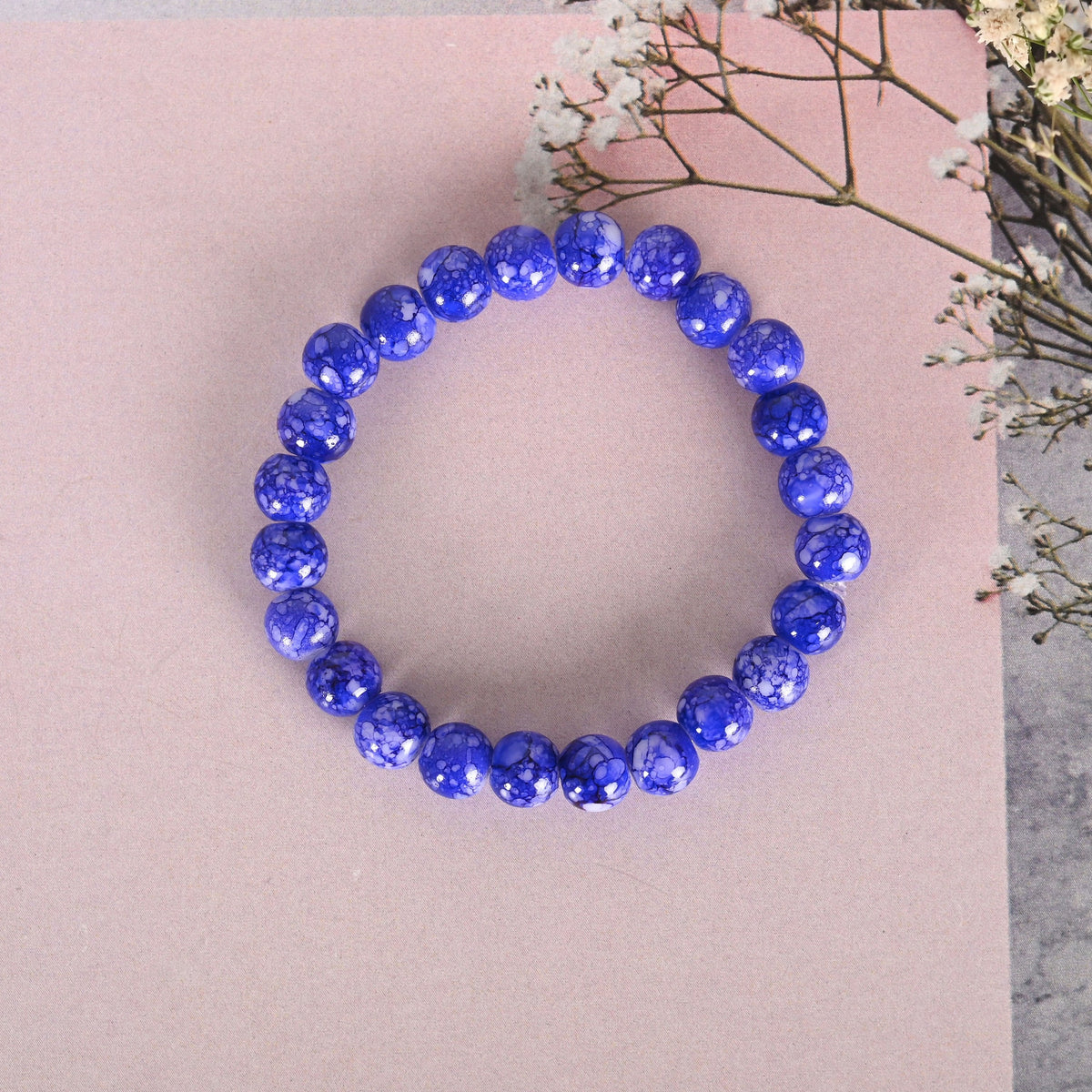 NVR Men & Women Blue Marbel Crystal Elasticated Bracelet | Grocsy
