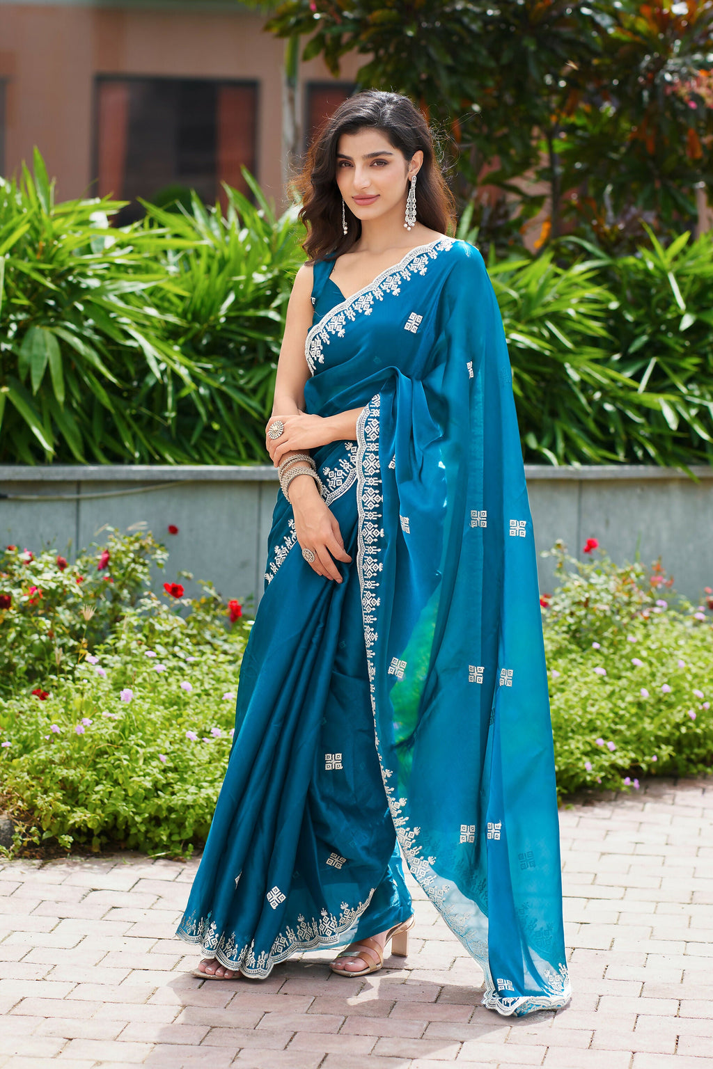 Vastranavya Teal Embroidery Work Shimmer Chiffon Saree with Unstitched Blouse | Grocsy