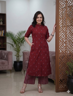 Teeya Creation Elegant Red Cotton Kurta Set Featuring Button Detail And Printed Palazzos | Grocsy