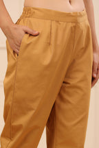 Juniper Women's Gold Cotton Twill Lycra Solid Straight Pant | Grocsy