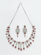 NVR Women's silver plated Maroon CZ stone handcrafted jewellery set | Grocsy