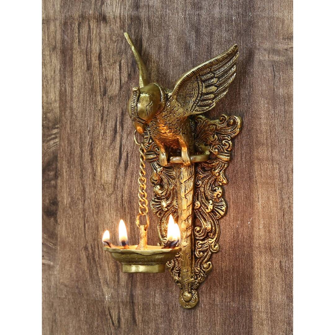 eCraftIndia Gold-Toned Handcrafted Bird Wall Hanging with Diya for 5 wicks | Grocsy