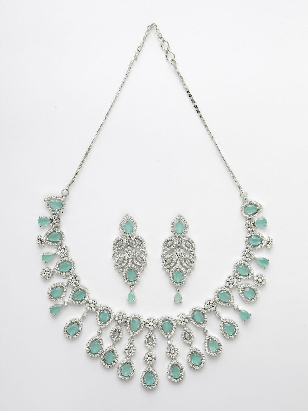 NVR Women's silver plated Turquoise CZ stone handcrafted jewellery set | Grocsy
