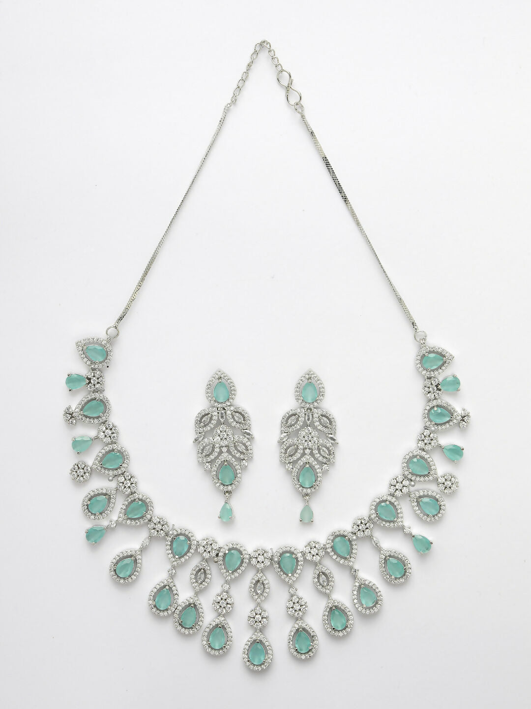 NVR Women's silver plated Turquoise CZ stone handcrafted jewellery set | Grocsy