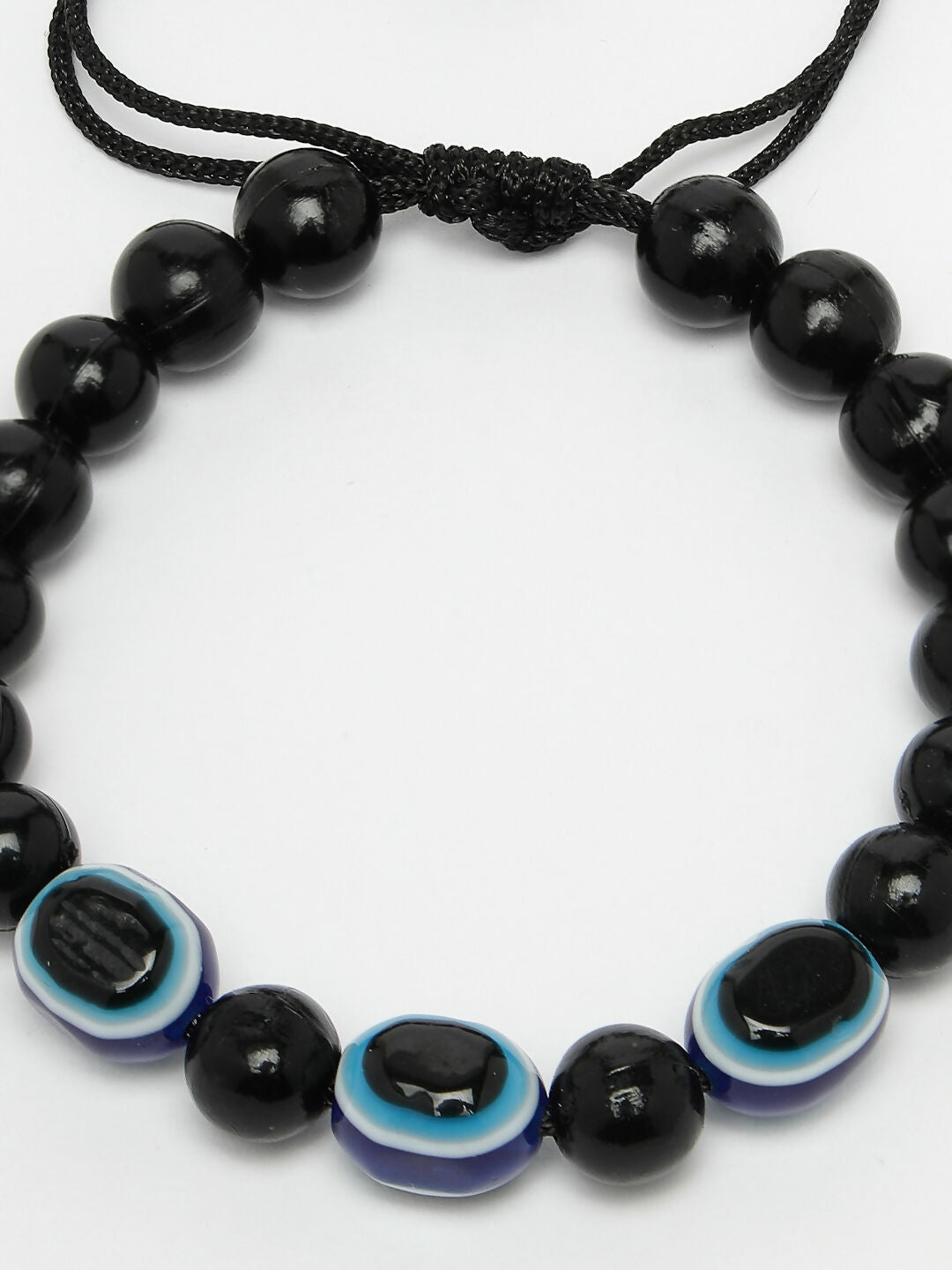 NVR Women & Men Black Evil Eye Rakhi With Roli Chawal | Grocsy