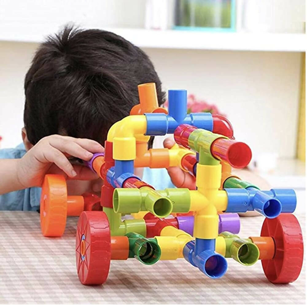 Kipa 150 Pieces Pipe Puzzle with Storage Container, Educational & Intellectual Playing Model Construction Blocks with Rolling Wheelbase | Grocsy