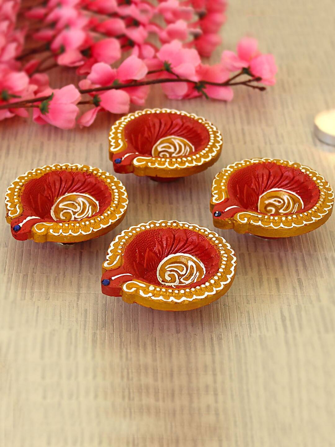 Tied Ribbons Set Of 4 Terracotta Diyas | Grocsy