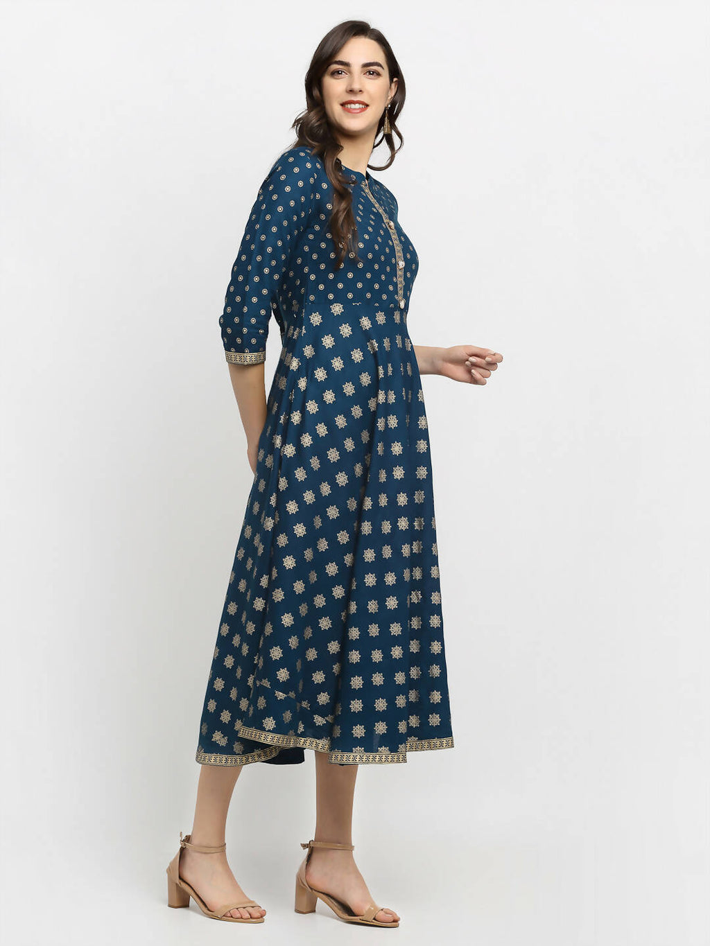 Rudra Bazaar A-Line Gold Floral Printed Turquoise Blue Kurti | Grocsy