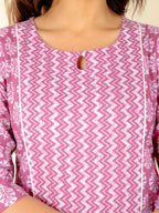 Aramya Pink Soft Cotton Floral Panelled Kurta for Women | Grocsy
