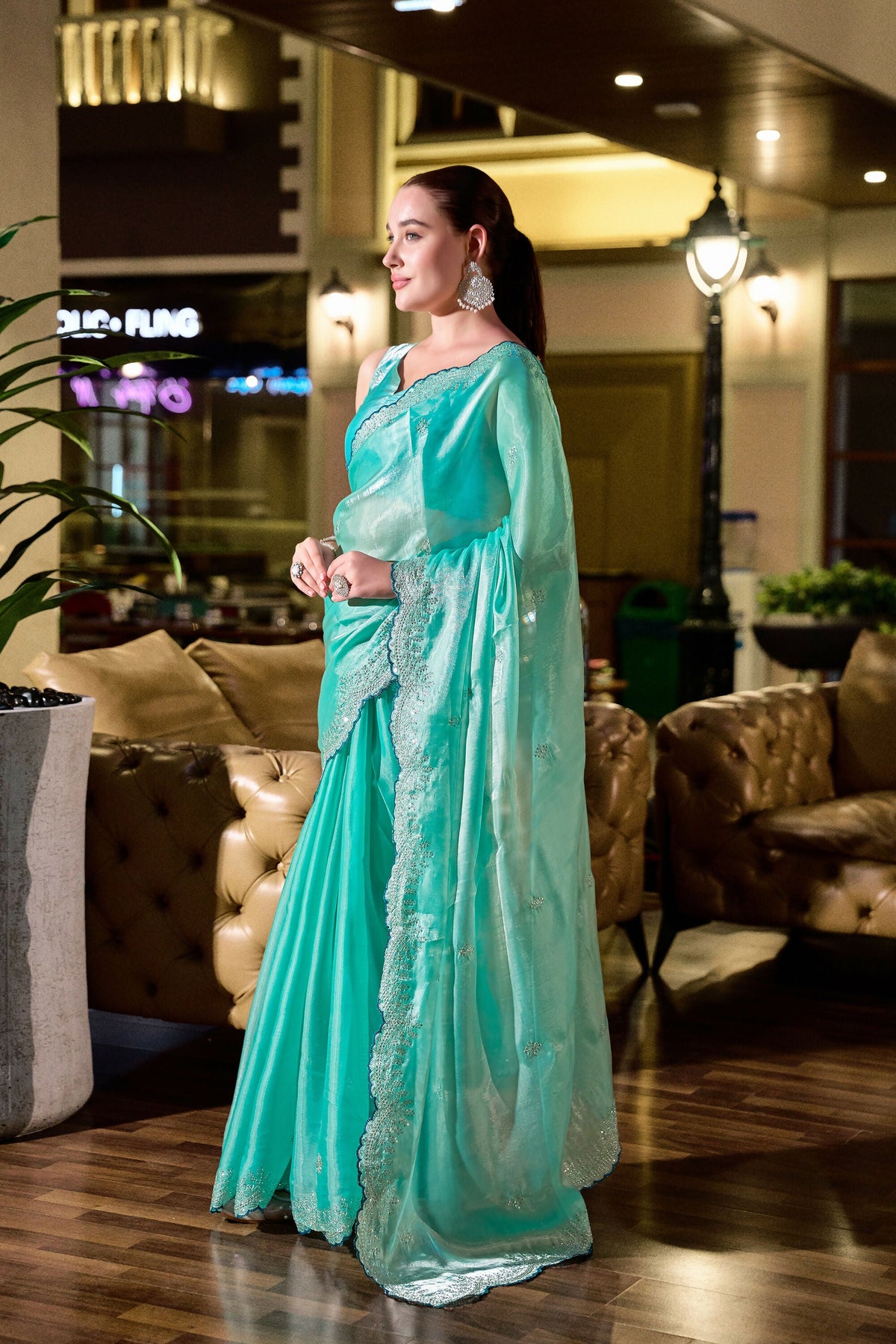 Vastranavya Turquoise Embroidery Work Shimmer Chiffon Saree with Unstitched Blouse | Grocsy