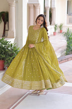 Evanik Mehendi Faux Georgette with Rich Sequins & Zari Embroidered work Gown | Grocsy