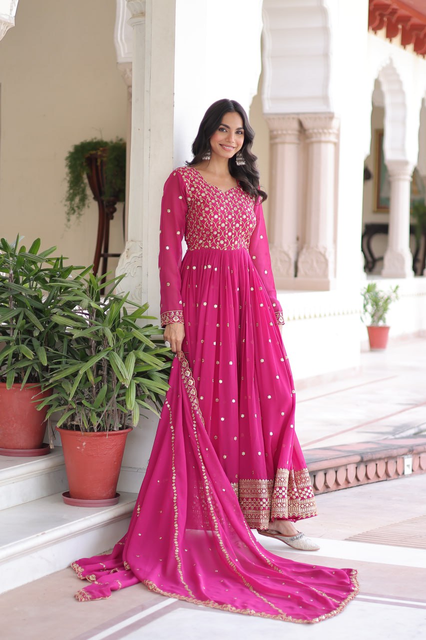Evanik Rani Pink Faux Georgette with Rich Sequins & Zari Embroidered work Gown | Grocsy