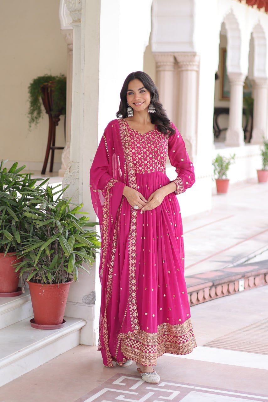 Evanik Rani Pink Faux Georgette with Rich Sequins & Zari Embroidered work Gown | Grocsy