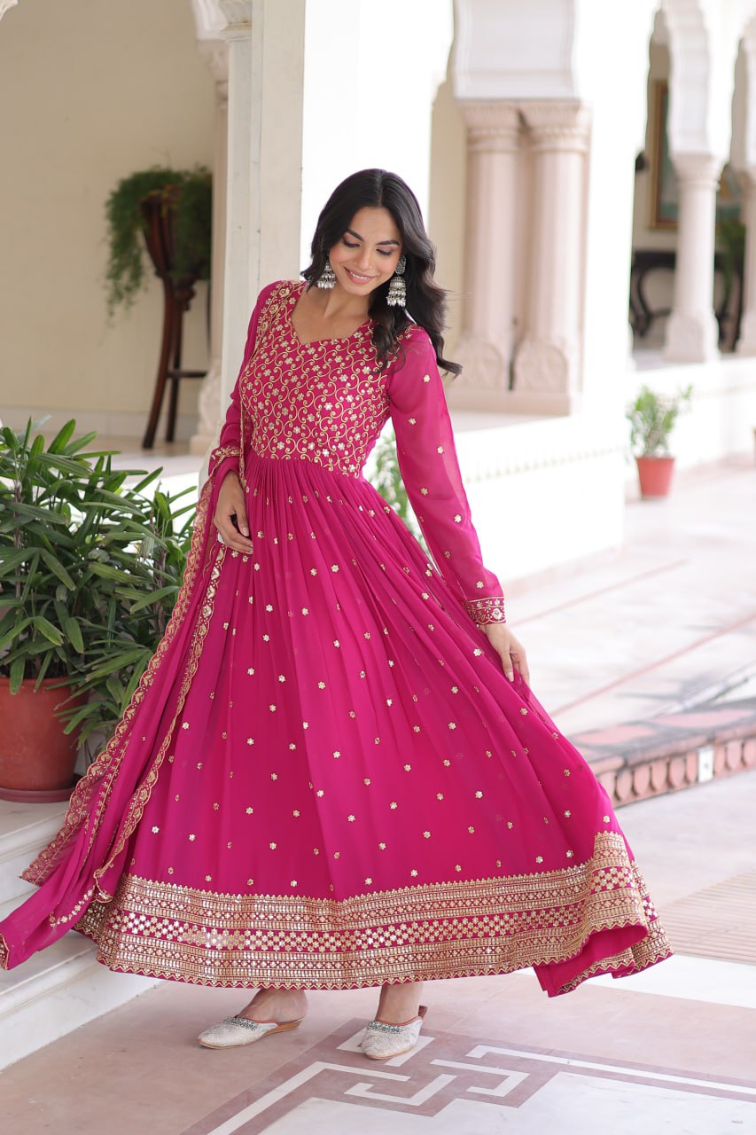 Evanik Rani Pink Faux Georgette with Rich Sequins & Zari Embroidered work Gown | Grocsy