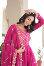 Evanik Rani Pink Faux Georgette with Rich Sequins & Zari Embroidered work Gown | Grocsy