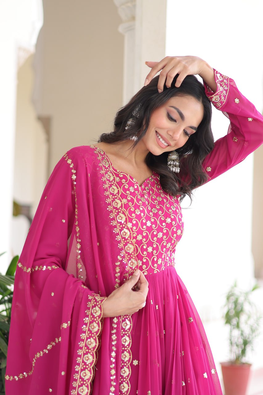 Evanik Rani Pink Faux Georgette with Rich Sequins & Zari Embroidered work Gown | Grocsy