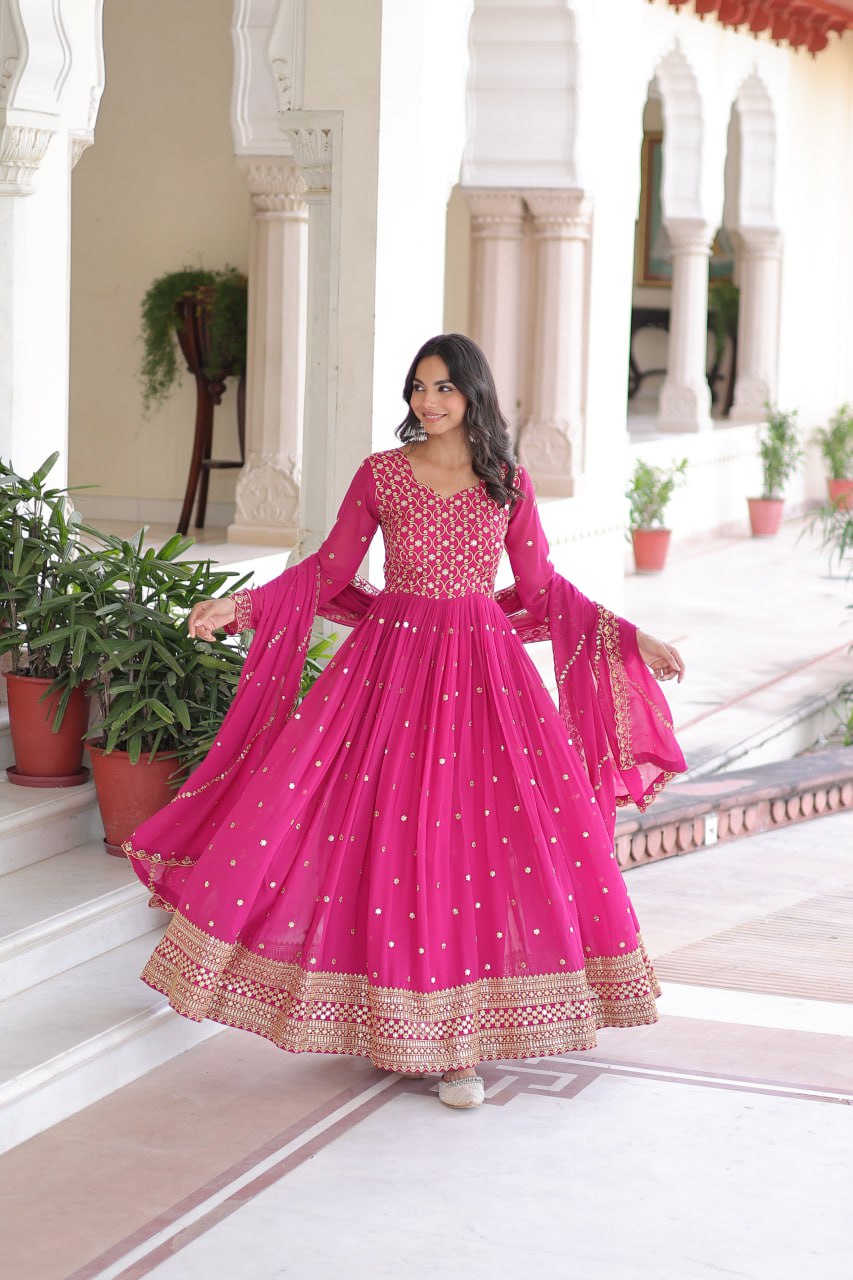Evanik Rani Pink Faux Georgette with Rich Sequins & Zari Embroidered work Gown | Grocsy