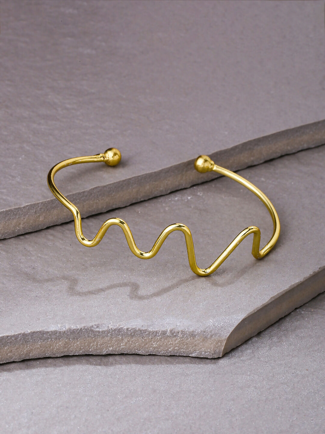 NVR Women Gold-Polished Adjustable Kada Bracelet | Grocsy