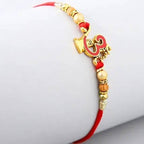 Auspicious Om Pearl Rakhi & Cashew Jar | Grocsy