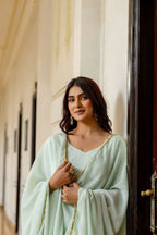 Teeya Creation Mint Green Chinnon Heavy Work Long Wedding Gown | Grocsy