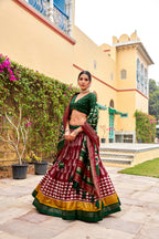 Vastranavya Printed and Foil Work Tussar Silk Lehenga with Unstitched Blouse - Maroon | Grocsy